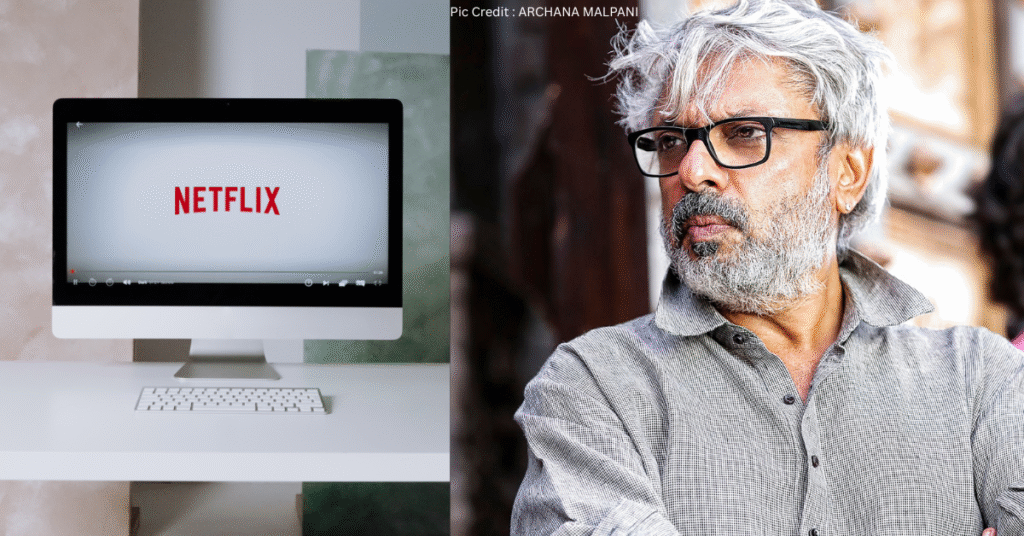 Sanjay Leela Bhansali with a Netflix screen showing his series 'Heeramandi'