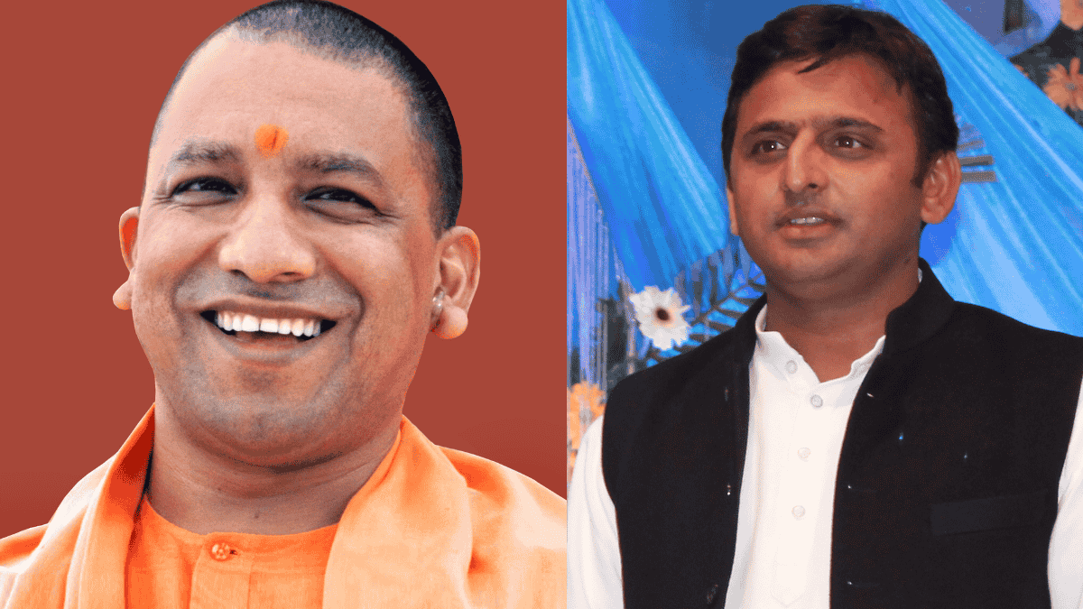 उत्तर प्रदेश के दो प्रमुख राजनीतिक नेता, एक केसरिया वस्त्र में और दूसरा सफेद शर्ट व काले कोट में मंच पर।