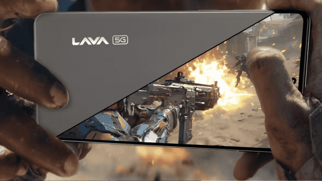 Person holding Lava 5G smartphone while playing an action video game, with explosions on screen.